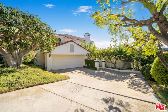 view of front of home featuring a garage