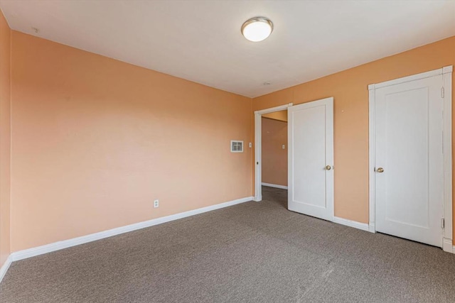 unfurnished bedroom featuring carpet flooring