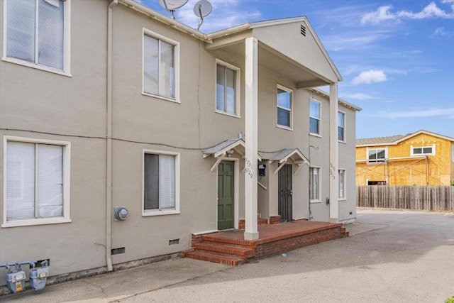 back of property with a patio area