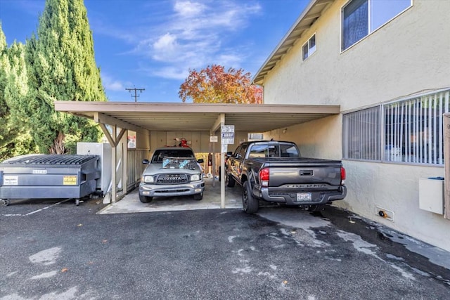 view of car parking with a carport