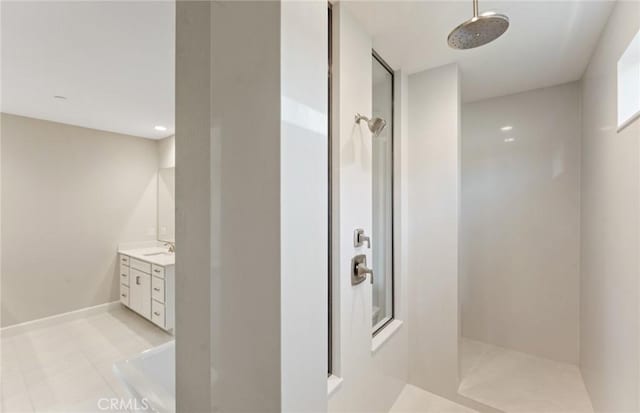 bathroom featuring vanity and a shower