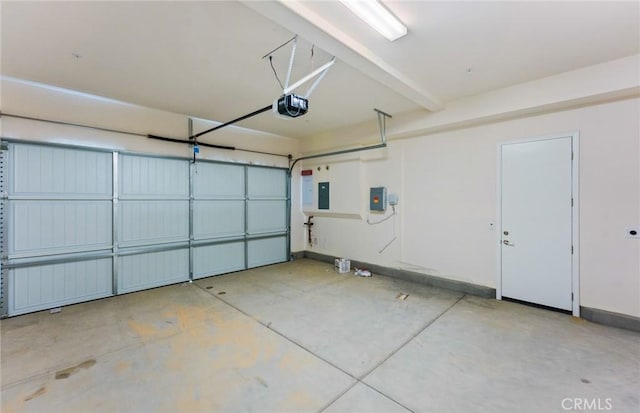 11722 Canoga Dr, Chatsworth, CA 91311 - garage featuring a garage door opener and electric panel