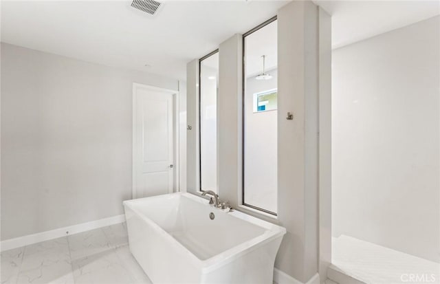 11722 Canoga Dr, Chatsworth, CA 91311 - full bath featuring a freestanding bath and marble finish flooring