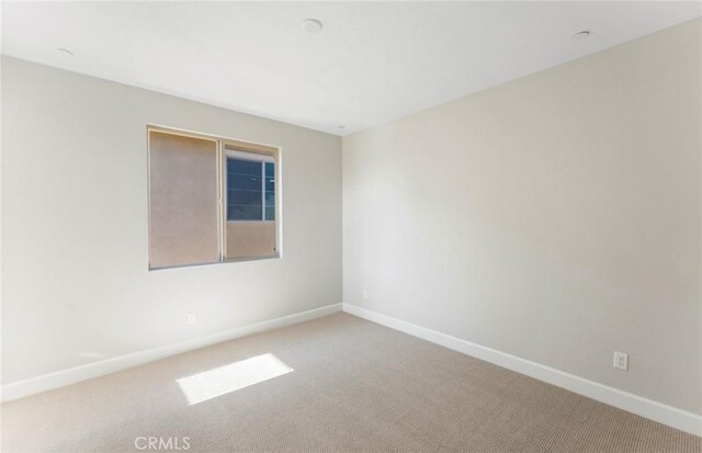 11722 Canoga Dr, Chatsworth, CA 91311 - carpeted empty room featuring baseboards