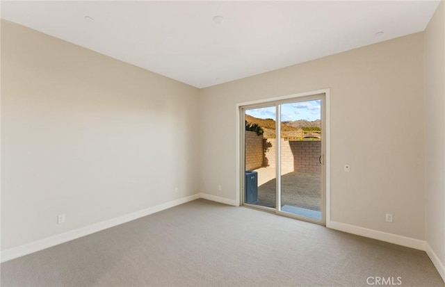 11722 Canoga Dr, Chatsworth, CA 91311 - unfurnished room with light colored carpet