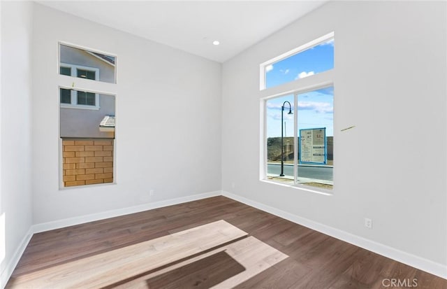 11722 Canoga Dr, Chatsworth, CA 91311 - unfurnished room featuring wood finished floors and baseboards