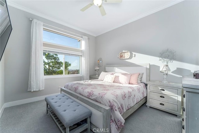 carpeted bedroom featuring ceiling fan and ornamental molding