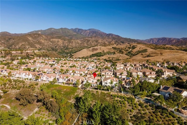 bird's eye view with a mountain view