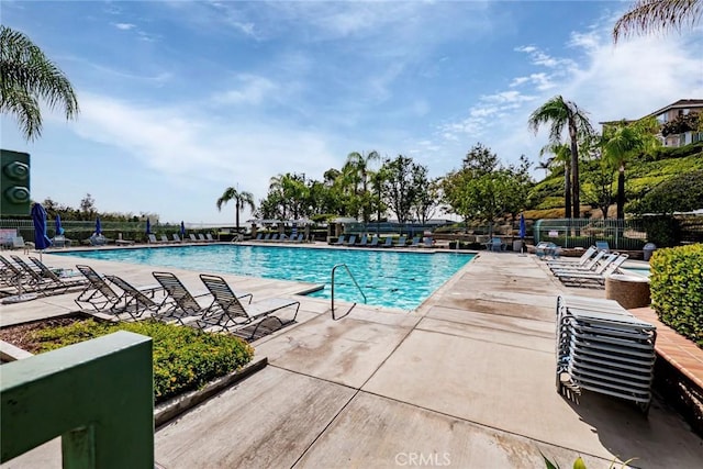 view of pool featuring a patio