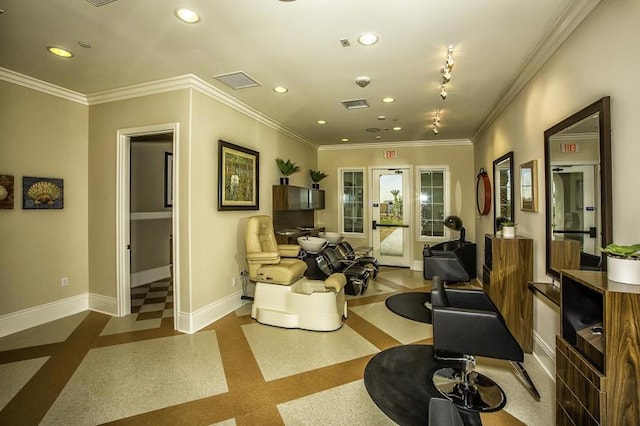 living area featuring ornamental molding