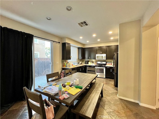 dining space featuring sink