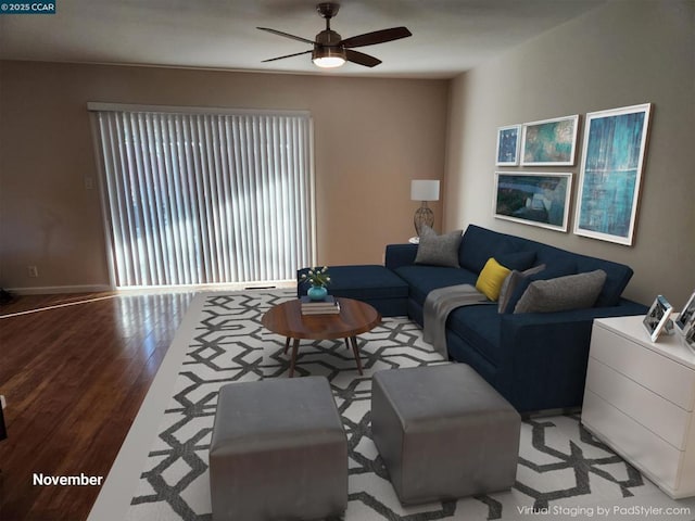 living room featuring light hardwood / wood-style floors and ceiling fan