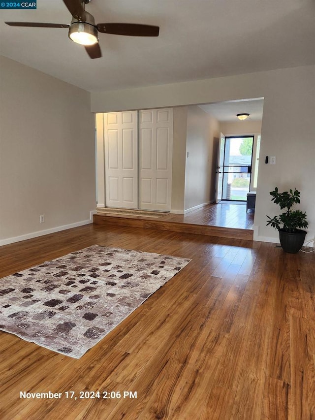 spare room featuring ceiling fan and wood-type flooring