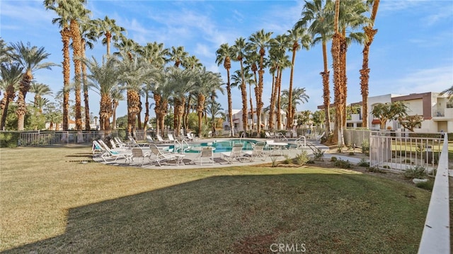 view of yard with a community pool