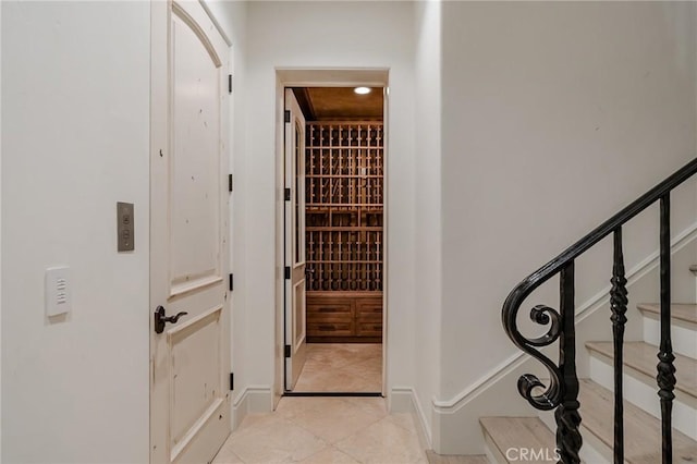 wine room with light tile patterned floors