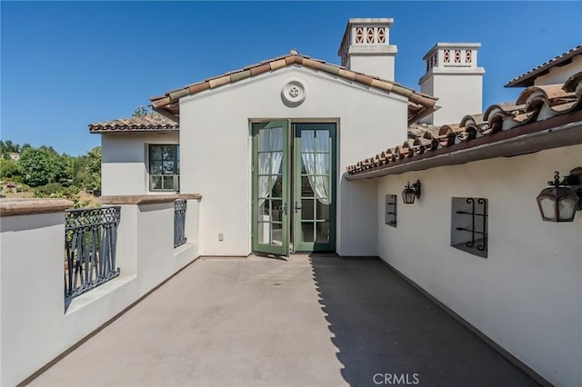 rear view of house with a patio area