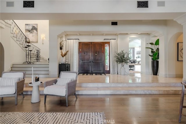 entryway with wood-type flooring