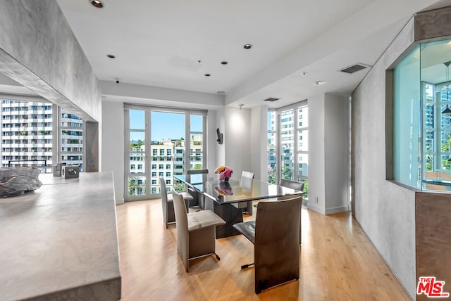 dining room featuring light wood-type flooring