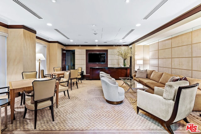 carpeted living room featuring crown molding