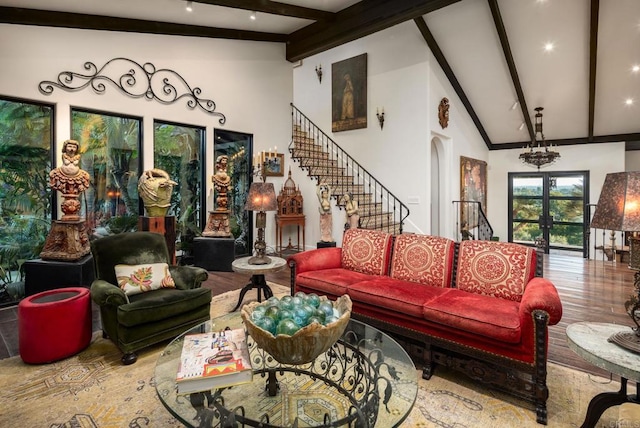 living room featuring high vaulted ceiling, french doors, hardwood / wood-style flooring, and beamed ceiling