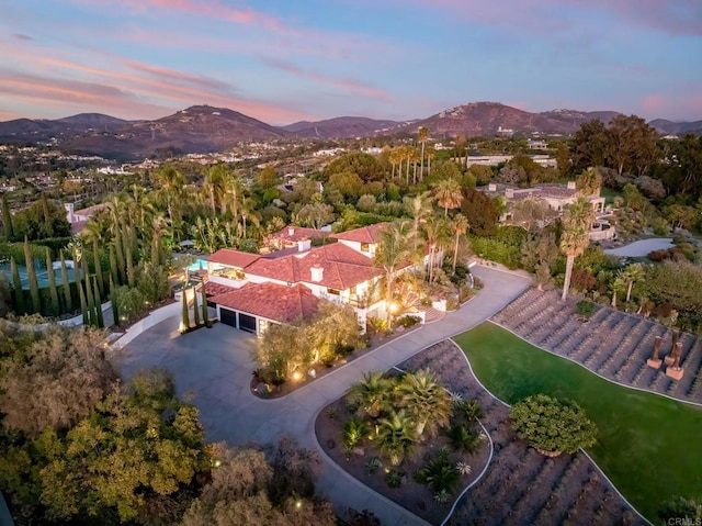 aerial view at dusk with a mountain view