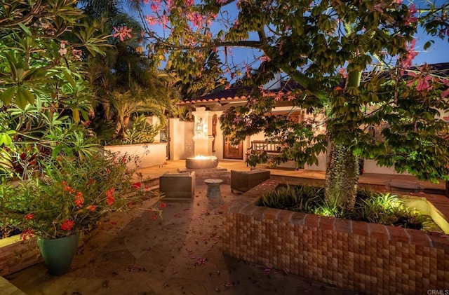 view of front of home with a patio