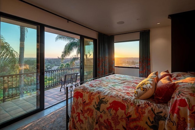 bedroom featuring access to outside and recessed lighting