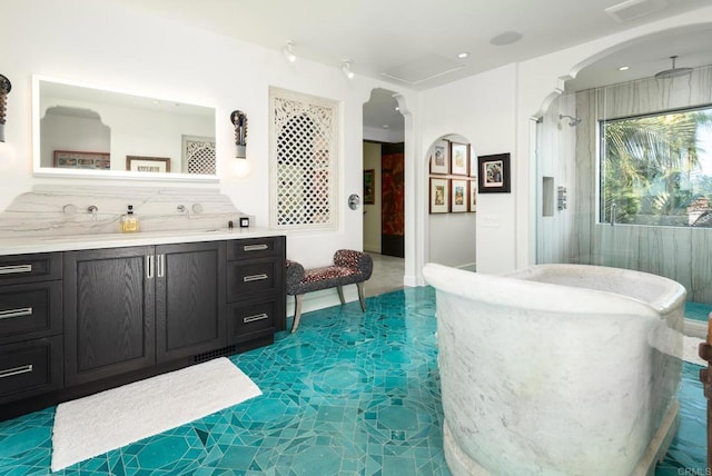 18245 Paseo Victoria, Rancho Santa Fe, CA 92067 - full bath featuring vanity, a freestanding tub, and a shower