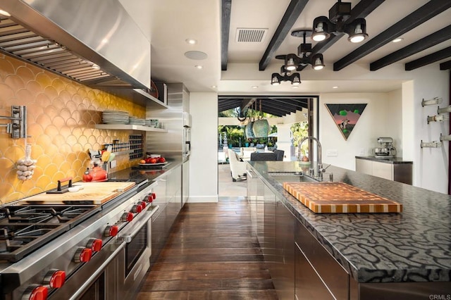 18245 Paseo Victoria, Rancho Santa Fe, CA 92067 - kitchen featuring double oven range, a sink, wall chimney range hood, dark wood-style flooring, and backsplash