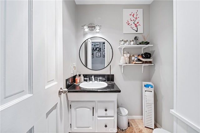 bathroom with tile patterned flooring and vanity