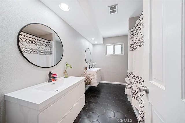 bathroom featuring vanity and tile patterned floors