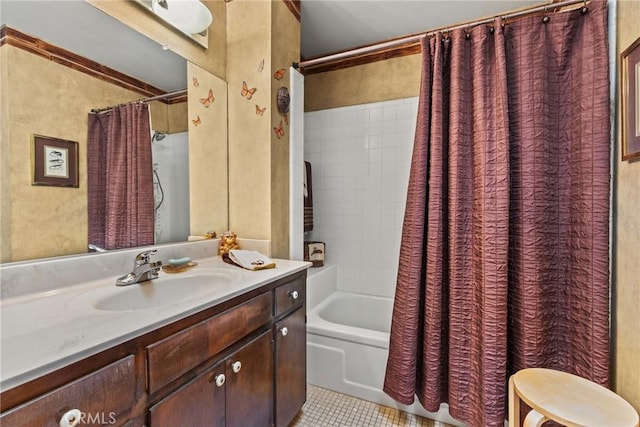 bathroom featuring tile patterned flooring, vanity, and shower / bath combo with shower curtain