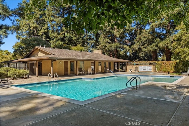 view of pool with a patio