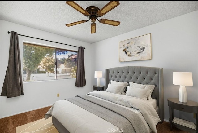 bedroom featuring baseboards, a ceiling fan, carpet, and a textured ceiling