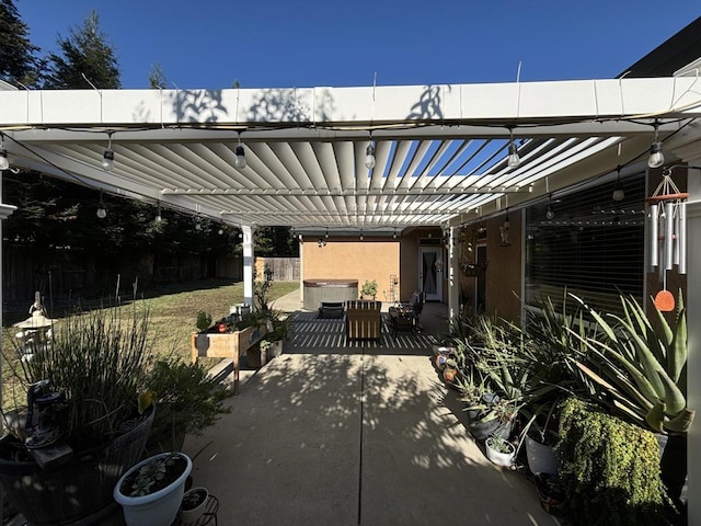 view of patio featuring a pergola and a hot tub