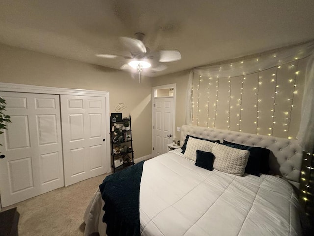 bedroom featuring carpet flooring, ceiling fan, and a closet