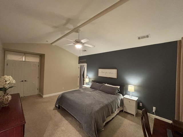 carpeted bedroom featuring ceiling fan and lofted ceiling with beams