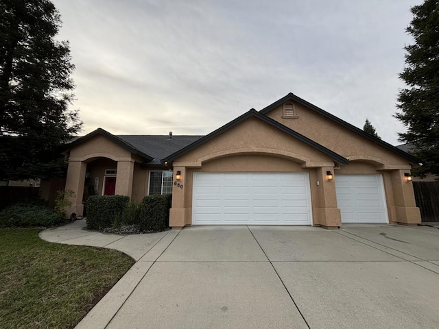 single story home featuring a garage