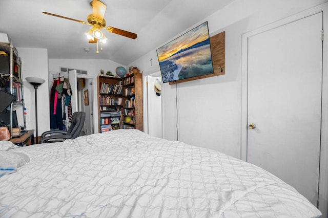 bedroom featuring ceiling fan and lofted ceiling