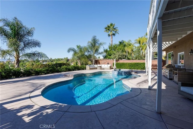 view of swimming pool featuring a grill, area for grilling, and a patio