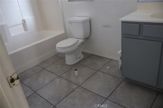 full bathroom with tile patterned flooring, vanity, shower / bath combination, and toilet