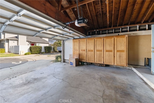 garage featuring a garage door opener