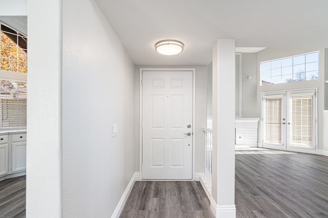 doorway to outside featuring french doors and dark hardwood / wood-style floors