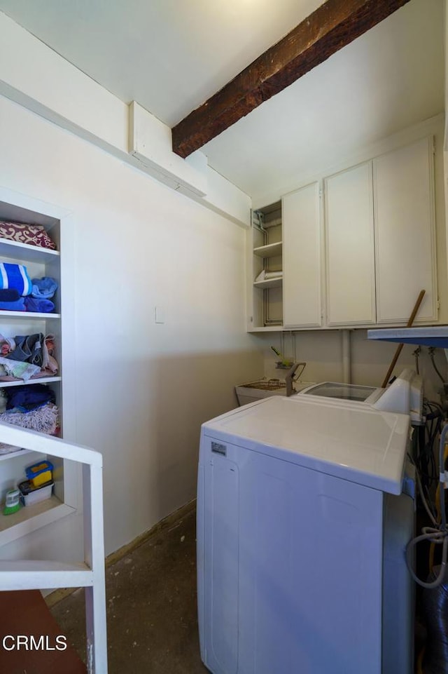 washroom featuring cabinets