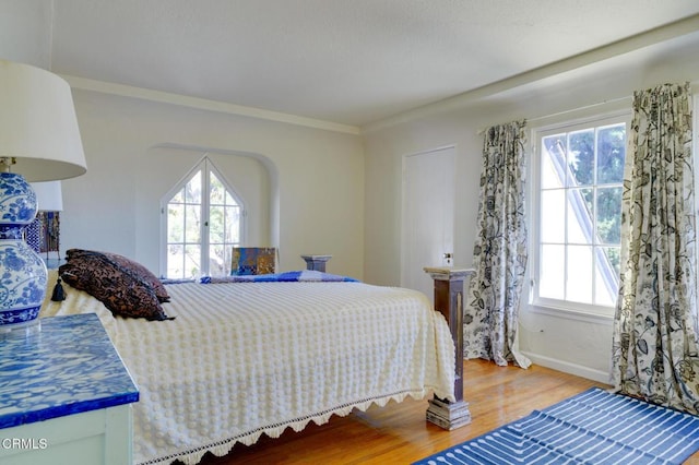 bedroom featuring hardwood / wood-style floors