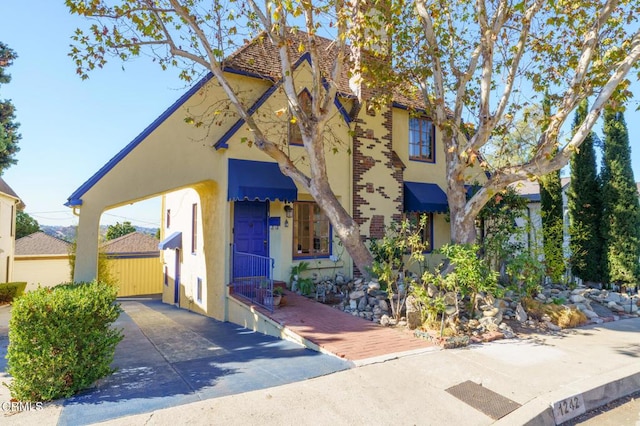 view of front of house featuring a carport