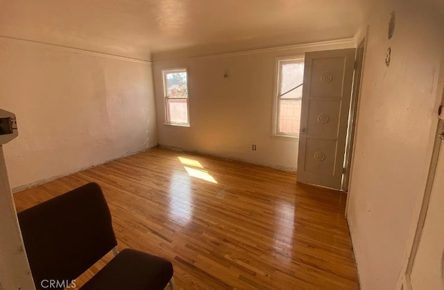 1816 W 76th St, Los Angeles, CA 90047 - unfurnished living room with wood finished floors