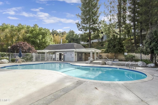 view of swimming pool featuring a patio