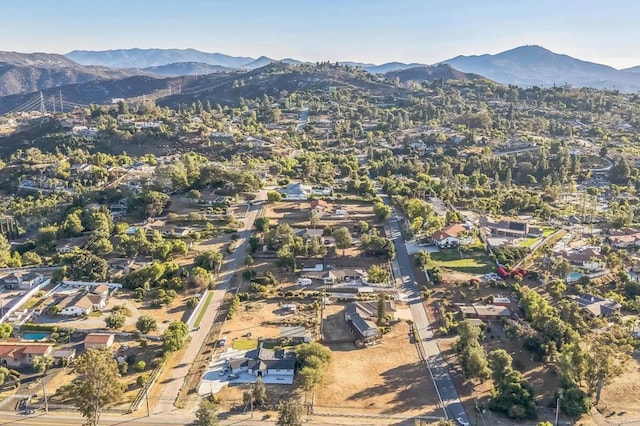 drone / aerial view featuring a mountain view