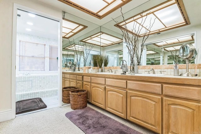 bathroom with vanity and backsplash